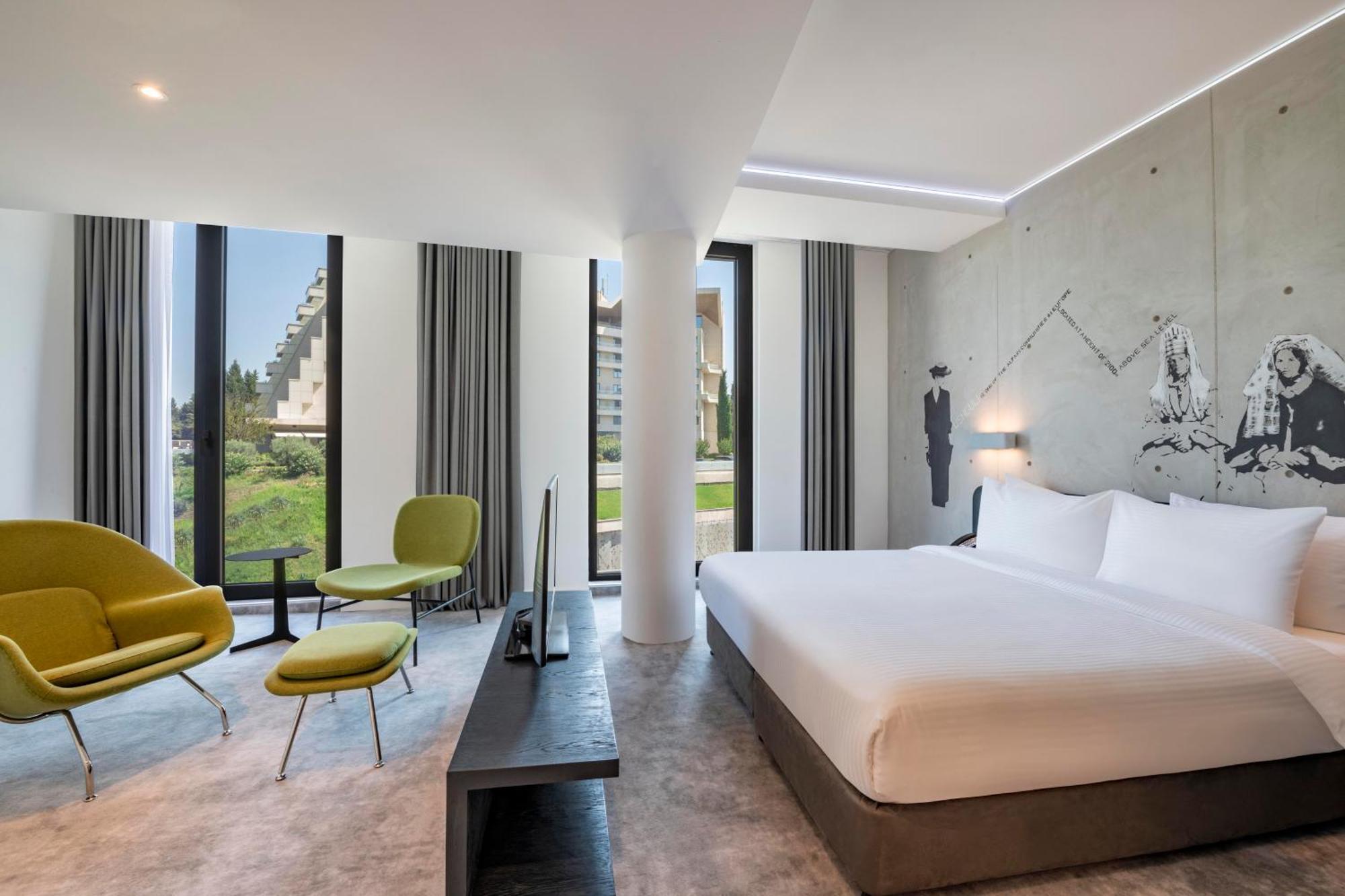 Golden Tulip Design Tbilisi Hotell Rom bilde